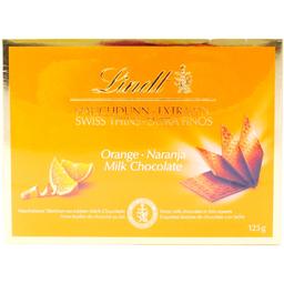 Цукерки Lindt Milk Thins молочний шоколад з апельсином, 125 г