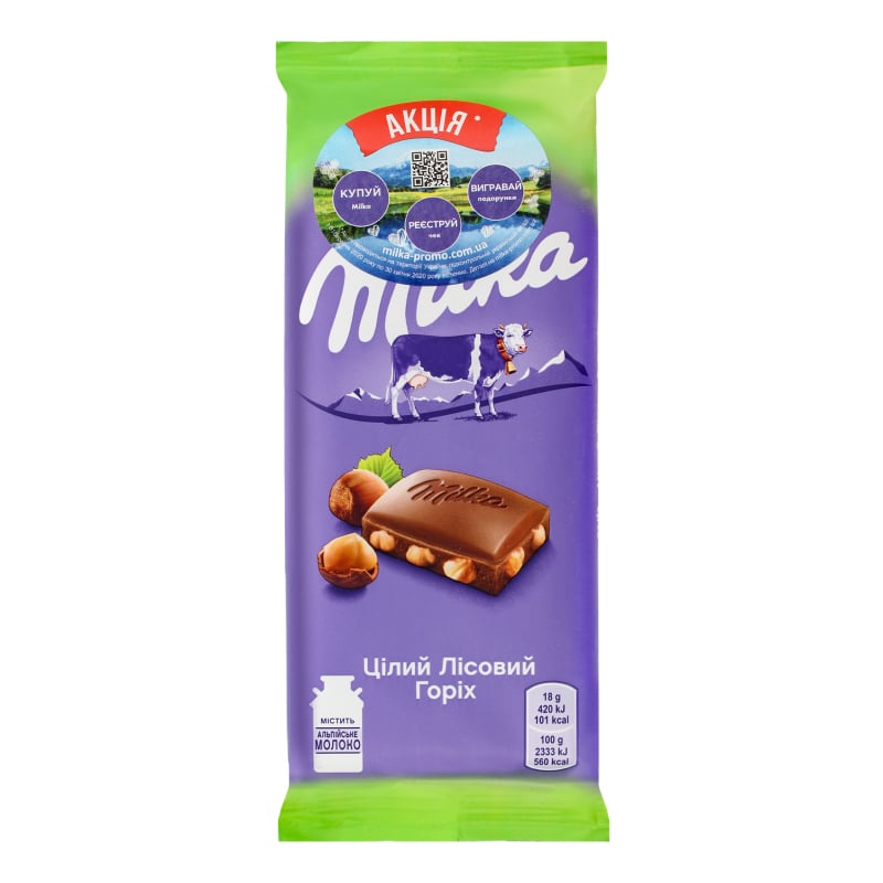 Молочний шоколад Milka з цільними лісовими горіхами, 90 г - фото 1