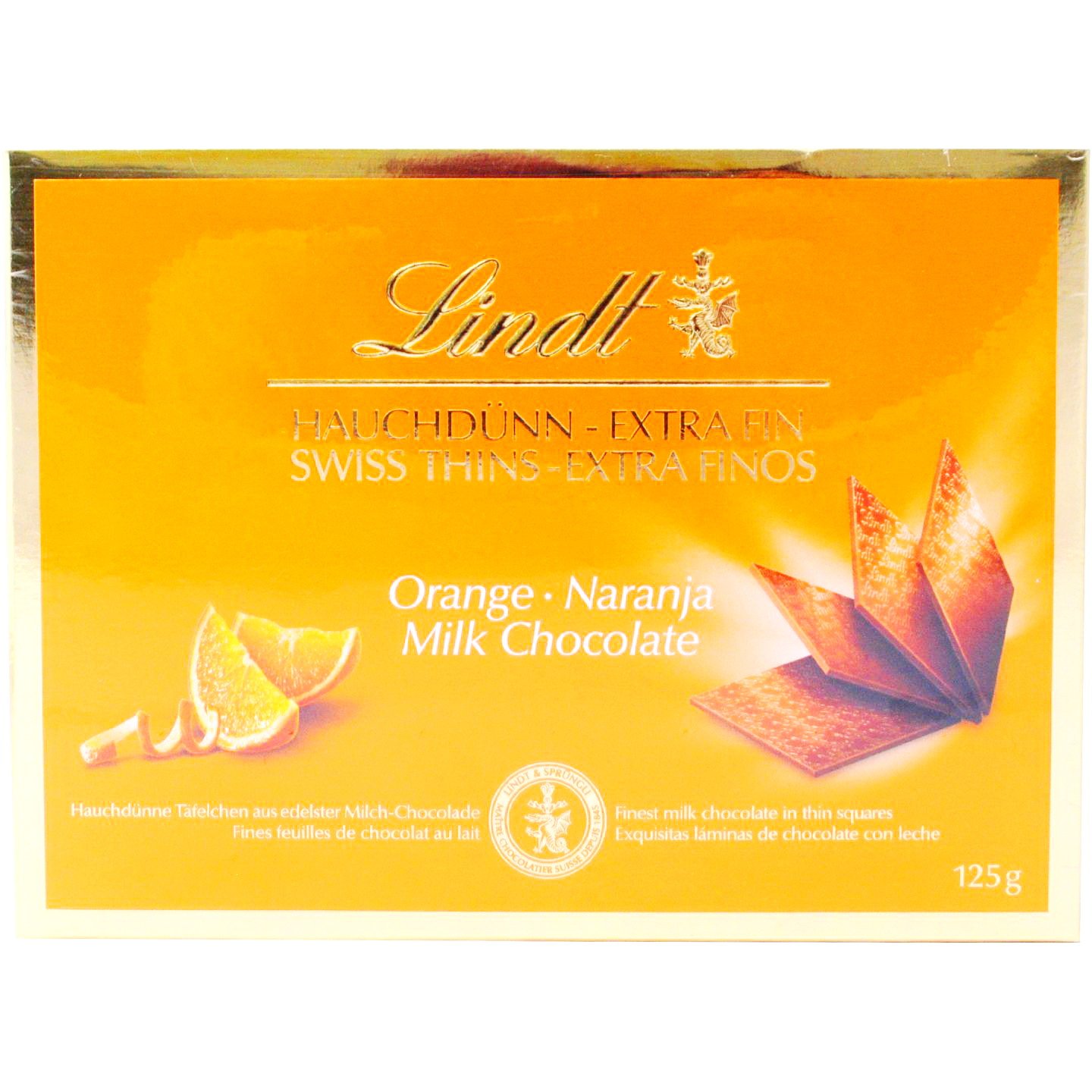 Цукерки Lindt Milk Thins молочний шоколад з апельсином, 125 г - фото 1