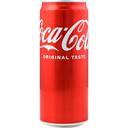 Отримай в подарунок 2 напої Coca-Cola Original Taste сильногазований 0.33 л до вибраного алкоголю.