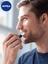 Бальзам для губ Nivea Men Active Care SPF 15 Активний догляд для чоловіків, 5,5 г - мініатюра 4