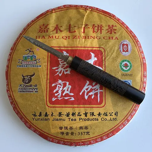 Шу Пуэр Jia Mu Qi Zi Bing Cha 357 грамм 2012 год