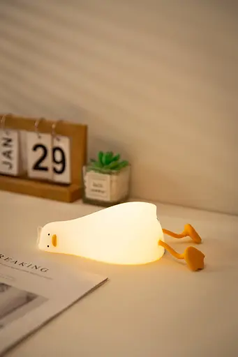 Силиконовый ночник "Лежащая утка" с подставкой для телефона - фото 8