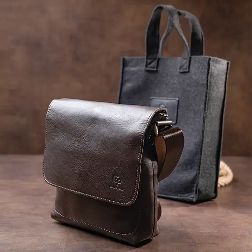 Чоловіча шкіряна сумка GRANDE PELLE 21х23х4,5 см sum0012521 - фото 10