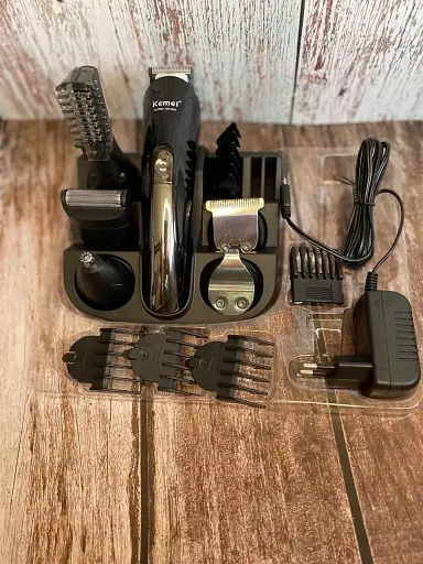 Многофункциональный набор для стрижки Kemei KM-600 (11 в 1, с подставкой) - фото 4