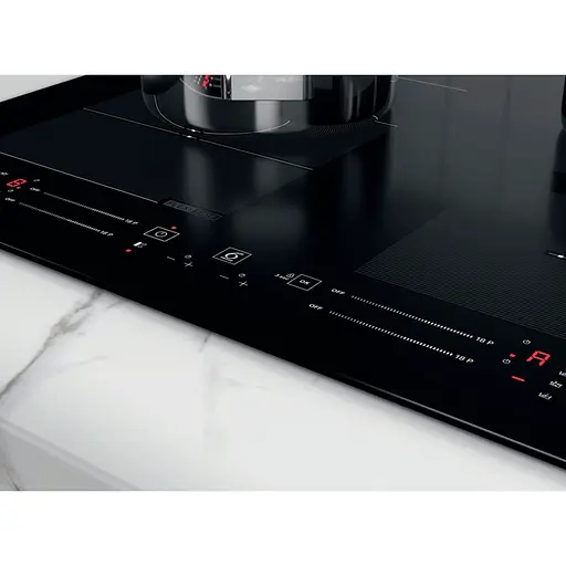 Варильна поверхня Whirlpool WFS0160NE із зоною об'єднання конфорок - фото 7