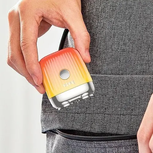 Портативная мужская роторная электробритва 3Вт Hoco Portable mini shaver DI30 IPX6 Оранжевая - фото 9