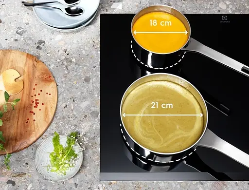 Варильна поверхня індукційна Electrolux 60 см розширена зона Hob2Hood чорний - фото 5