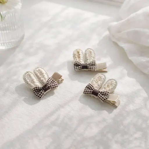 Набір декоративних шпильок для волосся з об'ємними вушками та бантиками 24 шт. - фото 2