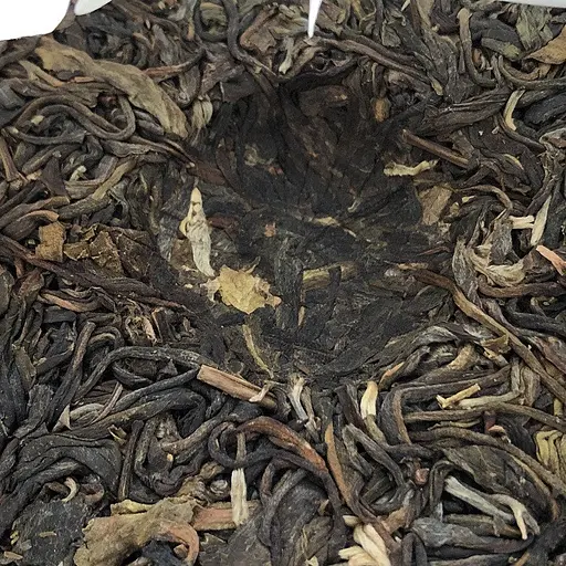 Шен пуер Man Zhuan Pu Er Cha 2021 року млинець 100 г - фото 4