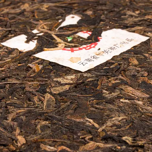 Шен Пуэр Куньмин Металл 2002 г. - блинчик, 357 г - фото 2