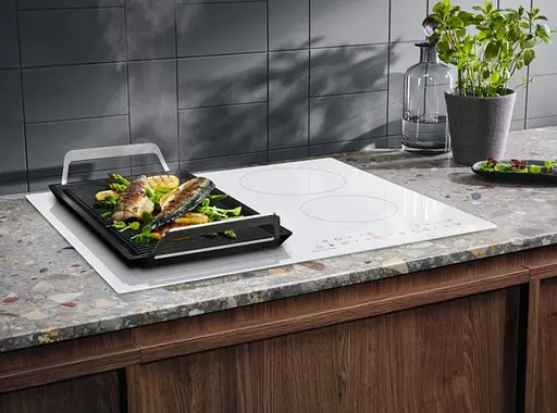 Варильна поверхня індукційна Electrolux 60 см розширена зона білий - фото 2
