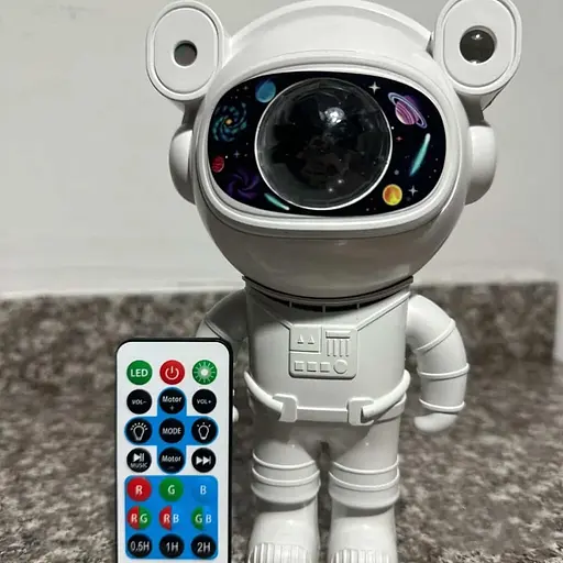 Лазерний нічник-проектор зоряного неба з bluetooth динаміком Astronaut projector light XL-818 білий - фото 7