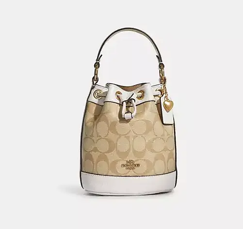 Жіноча сумка із фірмового полотна із підвіскою серце (Бежева) - фото 2