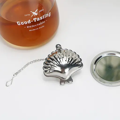 Ситечко заварник для заваривания чая и кофе в форме ракушки с цепочкой из нержавеющей стали Серебристый 88074 - фото 6