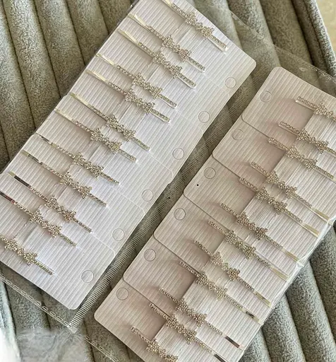 Набір заколки-невидимки з стразами у формі бантика 24 шт Серебристий - фото 1