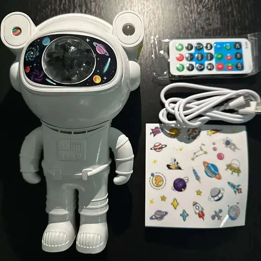 Лазерний нічник-проектор зоряного неба з bluetooth динаміком Astronaut projector light XL-818 білий - фото 4