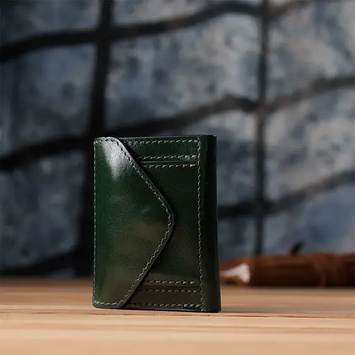 Отличный кошелек в три сложения из натуральной гладкой кожи Grande Pelle 7.5х10х2 см acs0029666 - фото 10