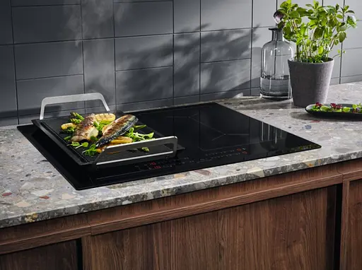Варильна поверхня індукційна Electrolux 60 см розширена зона чорний - фото 5