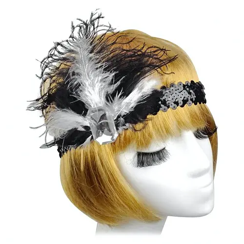 Резинка на голову з пером і камінцем - фото 1