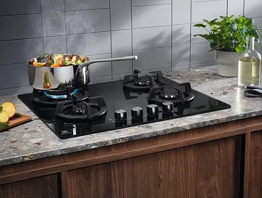 Варильна поверхня газова на склі Electrolux 60 см чугун чорний - фото 2