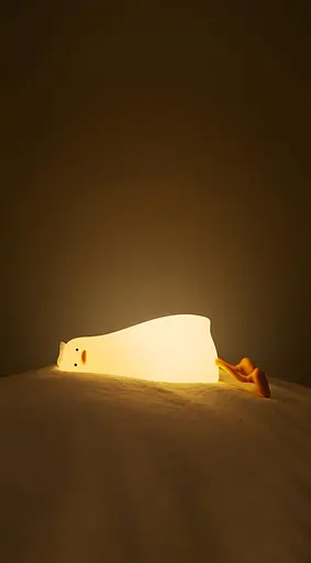 Силиконовый ночник "Лежащая утка" с подставкой для телефона - фото 2