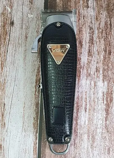 Професійна акумуляторна машинка VGR V-676 для стрижки волосся триммер 8 насадок Чорний - фото 4