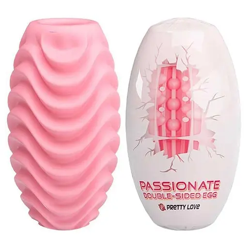 Яйце-мастурбатор текстуроване двостороннє силікон чоловічий аксесуар компактний рожевий