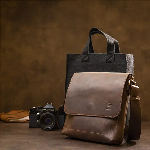 Кожаная мужская сумка GRANDE PELLE 24х24х6 см sum0015575 - фото 9