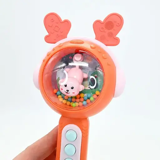 Интерактивная погремушка M 608 со звуками, мелодиями и светом, оранжевого цвета - фото 2