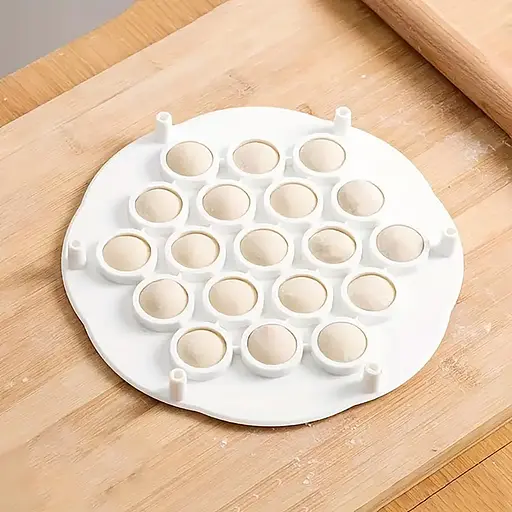 Пластикова пельменниця (форма для приготування пельменів) Ø21 см на 19 пельменів, Kitchen Master 87560 - фото 10