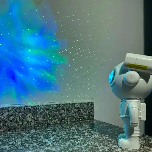 Лазерний нічник-проектор зоряного неба з bluetooth динаміком Astronaut projector light XL-818 білий - фото 5