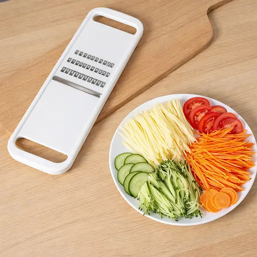 Терка-слайсер пластмасова для корейської моркви та для нарізання соломкою овочів 27х8 см Білий 88148 - фото 3