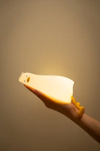 Силиконовый ночник "Лежащая утка" с подставкой для телефона - фото 6