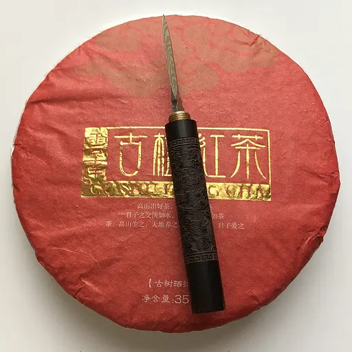 Чорний чай Gu shu hong cha Гу Шу Хонг Ча -млинець 357 г