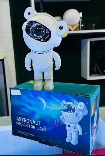 Лазерний нічник-проектор зоряного неба з bluetooth динаміком Astronaut projector light XL-818 білий - фото 8