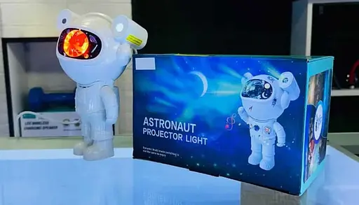 Лазерний нічник-проектор зоряного неба з bluetooth динаміком Astronaut projector light XL-818 білий - фото 9