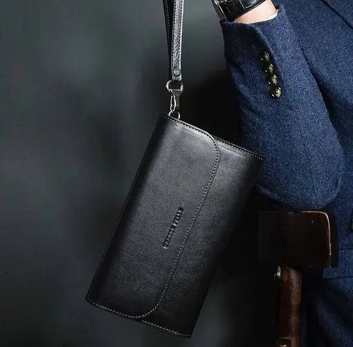 Чоловічий шкіряний клатч GRANDE PELLE 22,5х13х4 см sum0023149 - фото 2