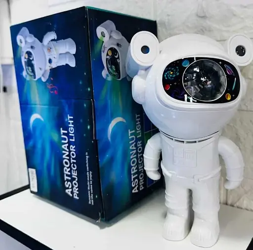 Лазерний нічник-проектор зоряного неба з bluetooth динаміком Astronaut projector light XL-818 білий - фото 10
