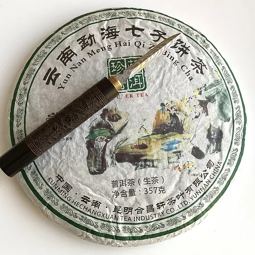 Шен Пуер Yun Nan Meng Hai Qi Zi Bing Cha 2017 року 357 г
