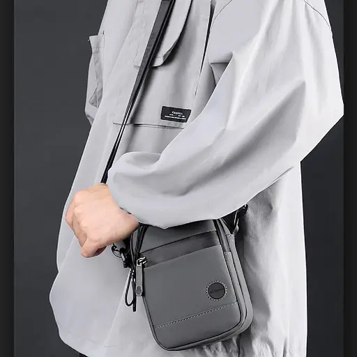 Чоловічий маленький месенджер-бананка Confident AT08-1237G