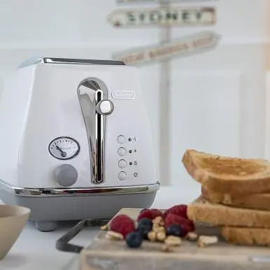 Тостер Delonghi CTOC 2103.W - фото 4