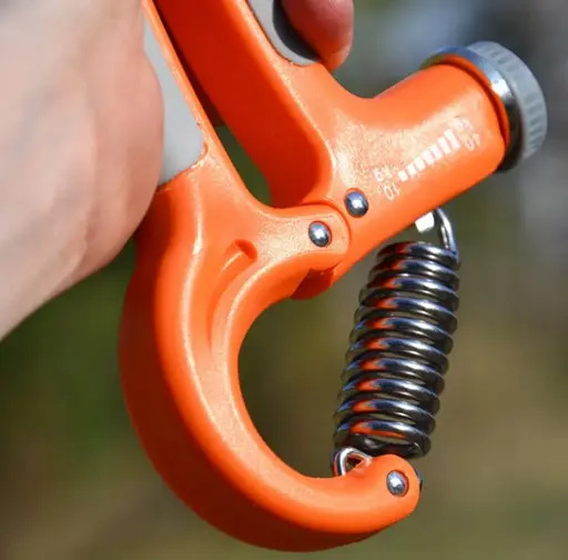 Еспандер кістьовий Power System PS-4021 з регульованим навантаженням 10-40 кг Power Hand Grip Orange (PS-4021_Orange) - фото 4