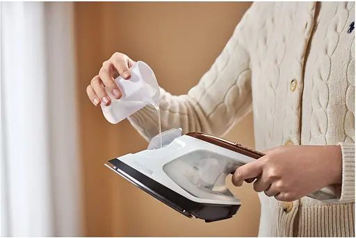 Sencor Отпариватель компактный, 1800Вт, 180мл, постоянный пар - 25гр, керамическая подошва, бело-коричневый - фото 6