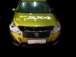 Дефлектор капоту мухобійка для Suzuki SX4 2013-. темний