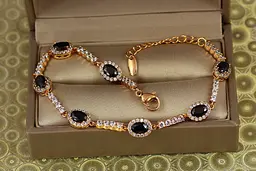 Браслет Xuping Jewelry малинки із чорними каменями на доріжці 17,5 см 7 мм золотистий