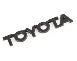 Емблема напис Toyota матова Чорна 115х20 мм Пластик на скотчі (Завод)