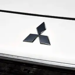 Емблема Mitsubishi 90х78 мм Чорна Пластик на скотчі (Завод) - мініатюра 3
