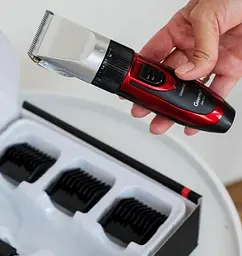 Професійна машинка для стрижки волосся Geemy GM-550 тример зі змінним акумулятором та насадками - мініатюра 4