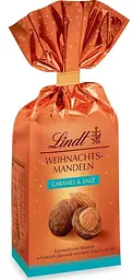 Шоколадні цукерки з мигдалем Lindt Weihnachts Mandeln Caramel Salz 100г - мініатюра 2